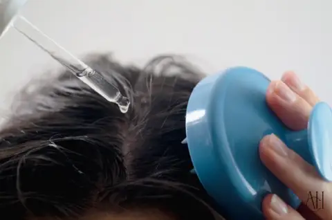 cuoio capelluto sano per la crescita dei capelli